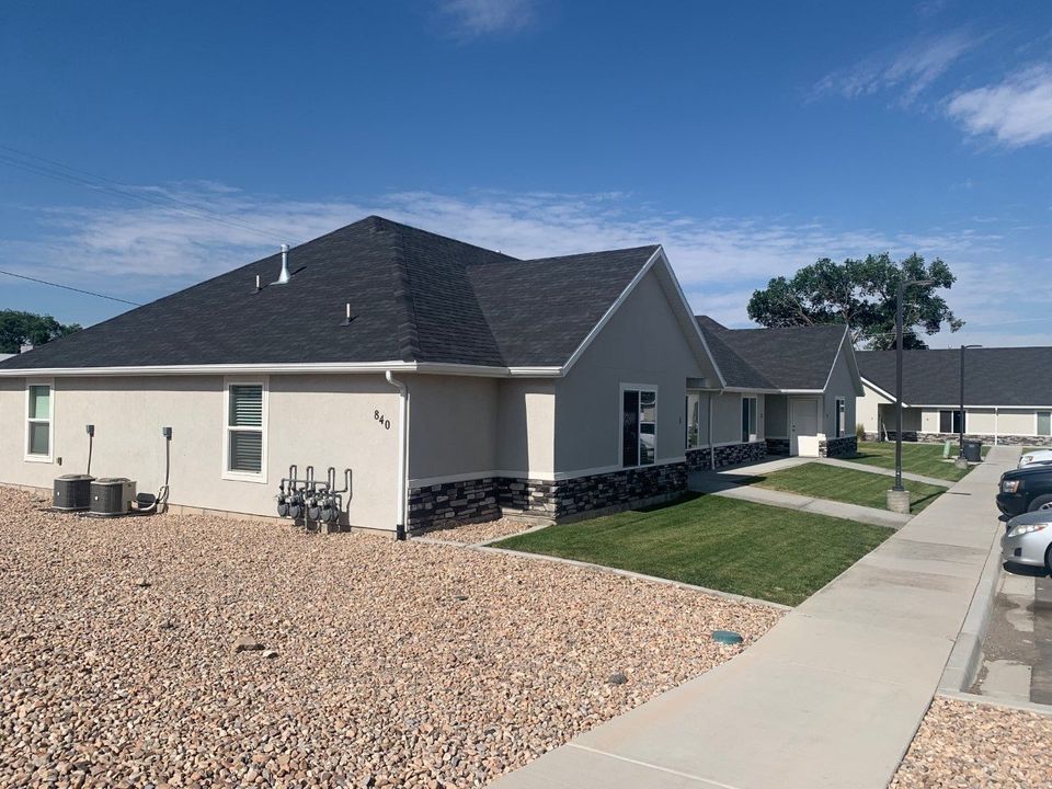 Ray&rsquo;s Apartments in Nephi Utah exterior with clean landscaping and parking