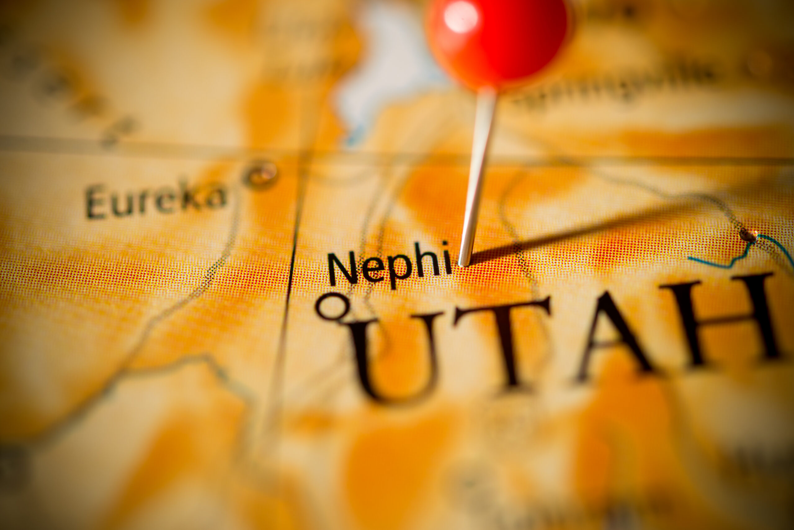 Nephi Utah real estate forecast 2026 with residential rooftops and mountain foothills